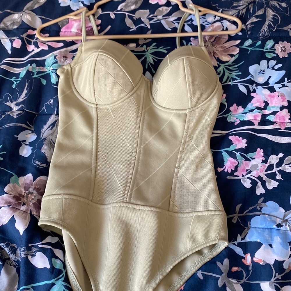 Light green body suit